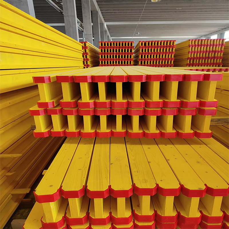 Factory stock of yellow H20 timber beams with red end protection